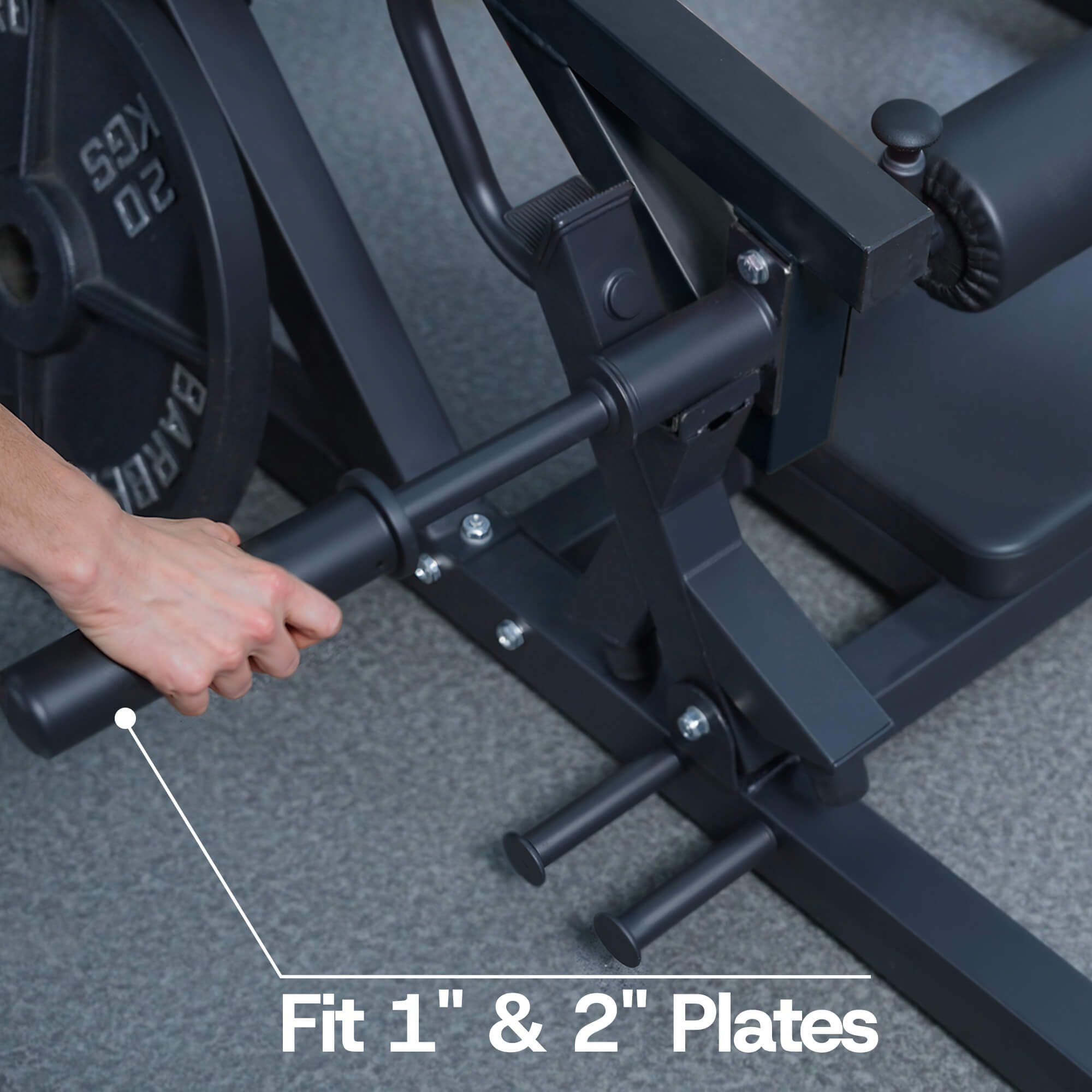 Gym equipment with a hand adjusting a bar, labeled 'Fit 1" & 2" Plates'.
