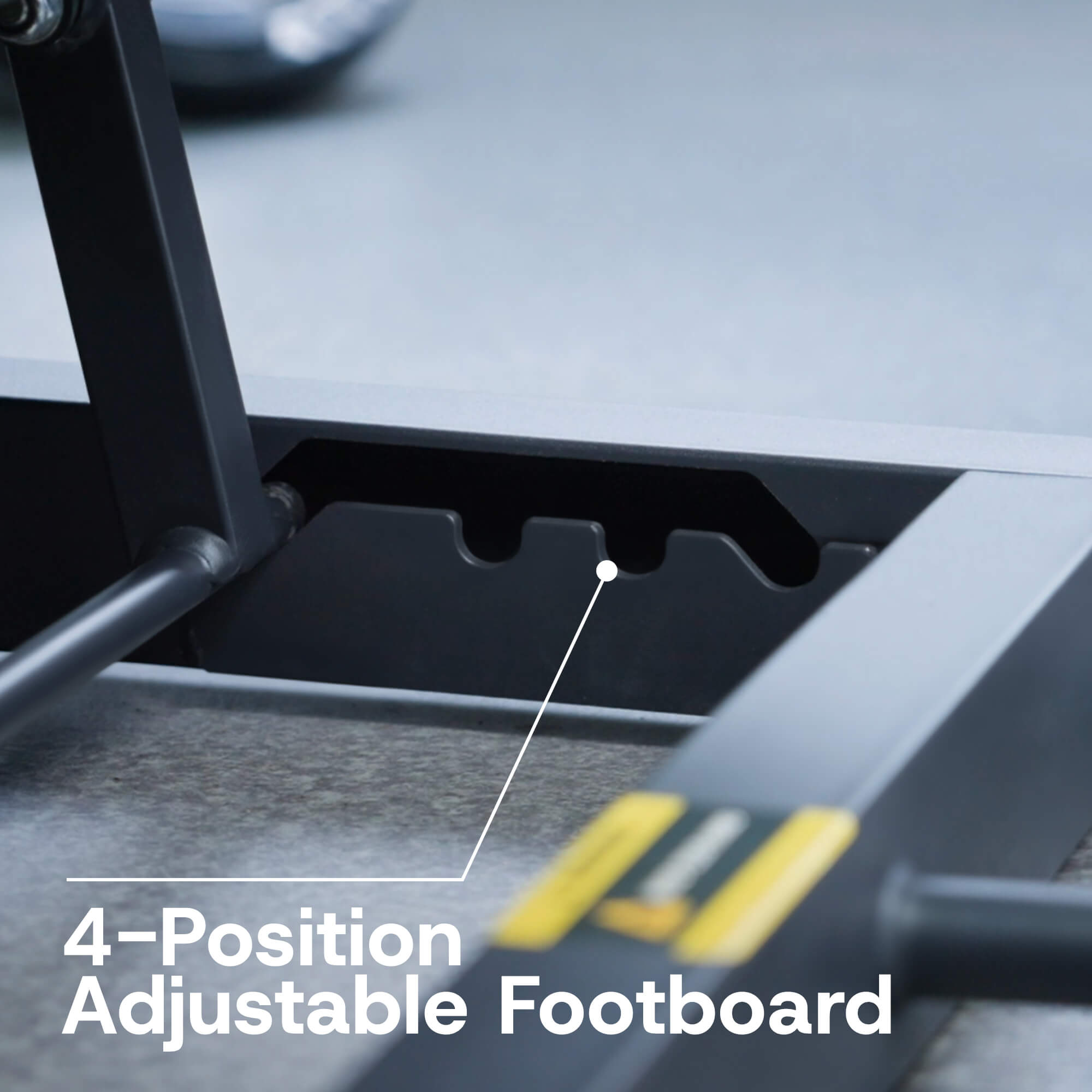 4-position adjustable footboard on a piece of exercise equipment with text overlay.