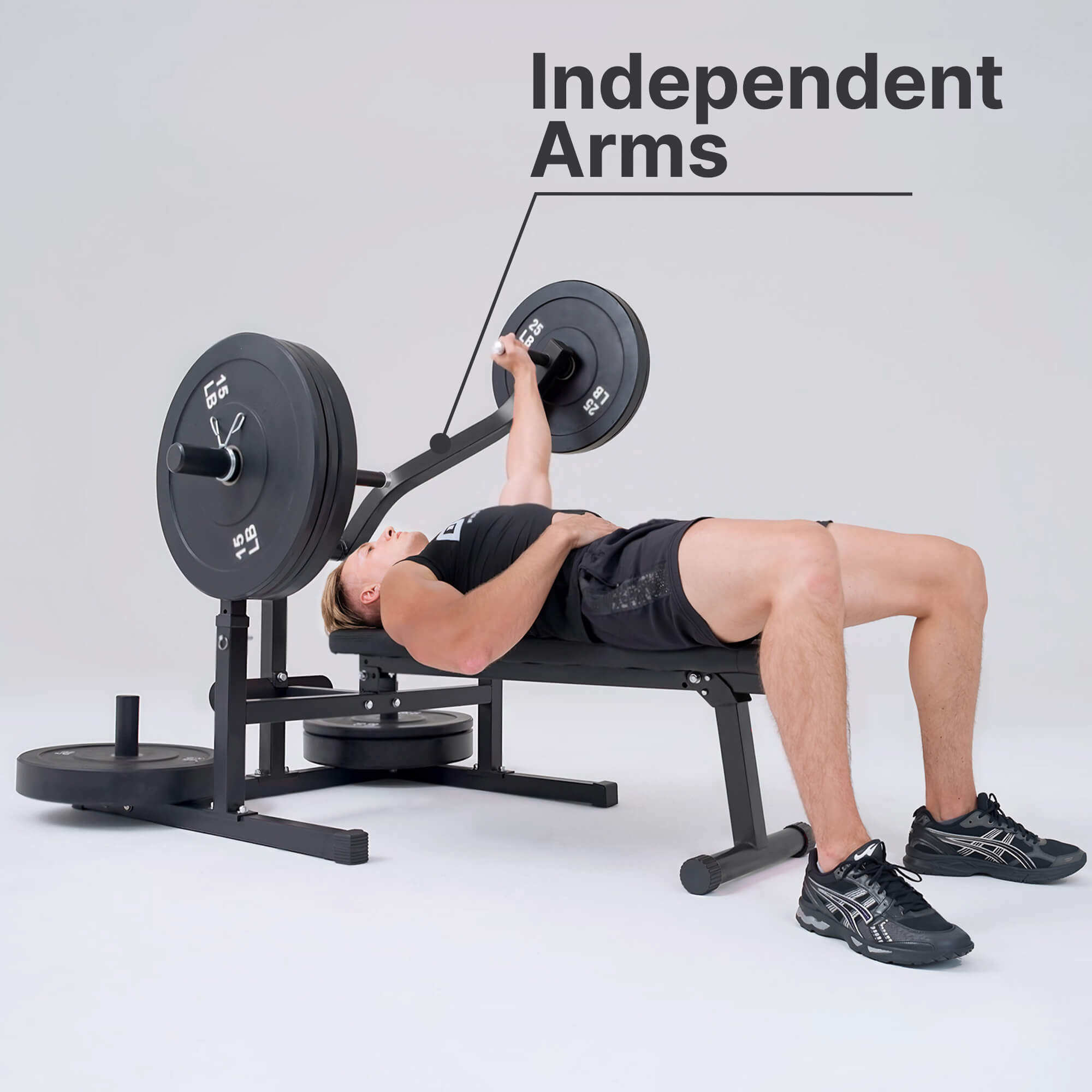 Person using a weight bench with weights on a light gray background.#color_black
