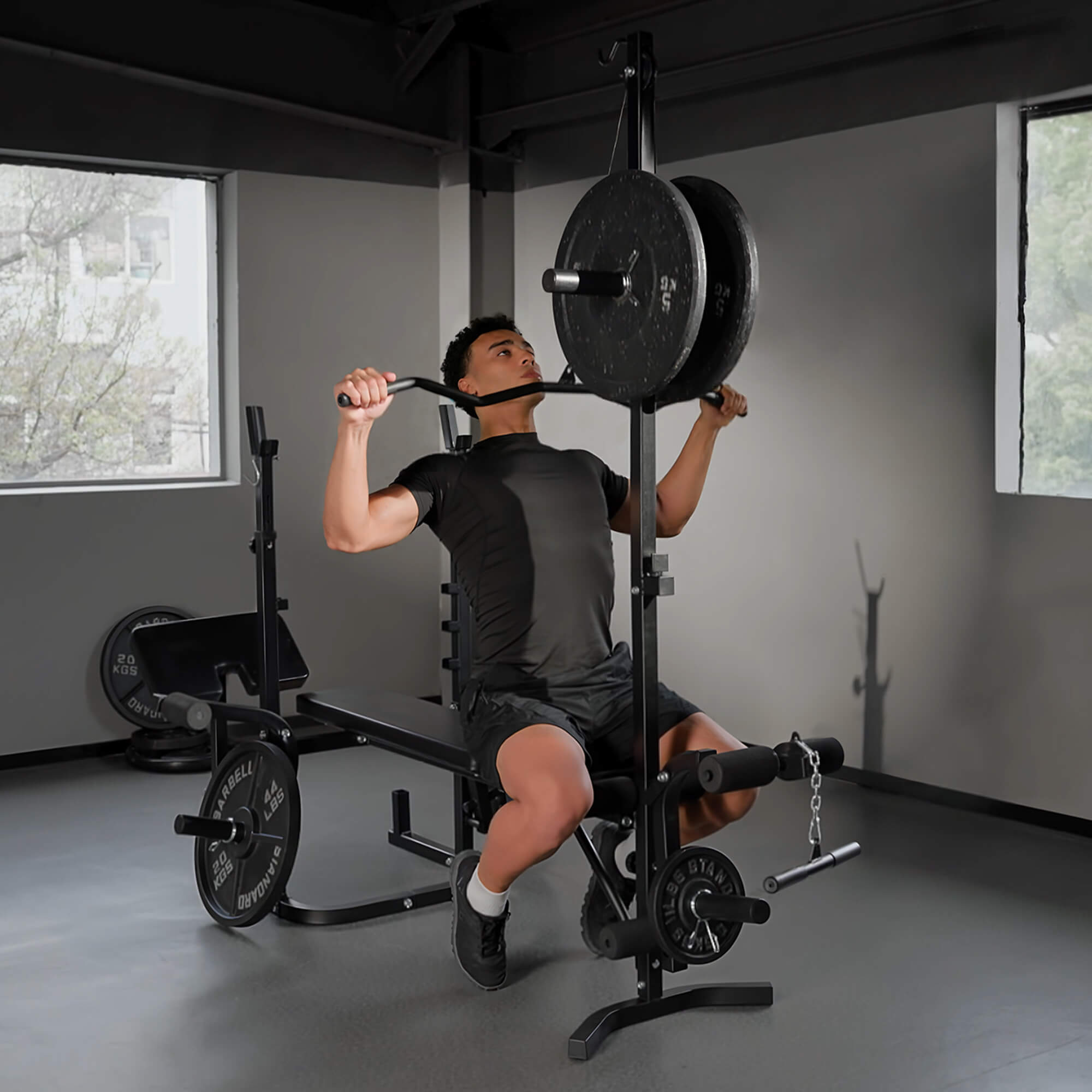 Person using a weight machine in a gym setting