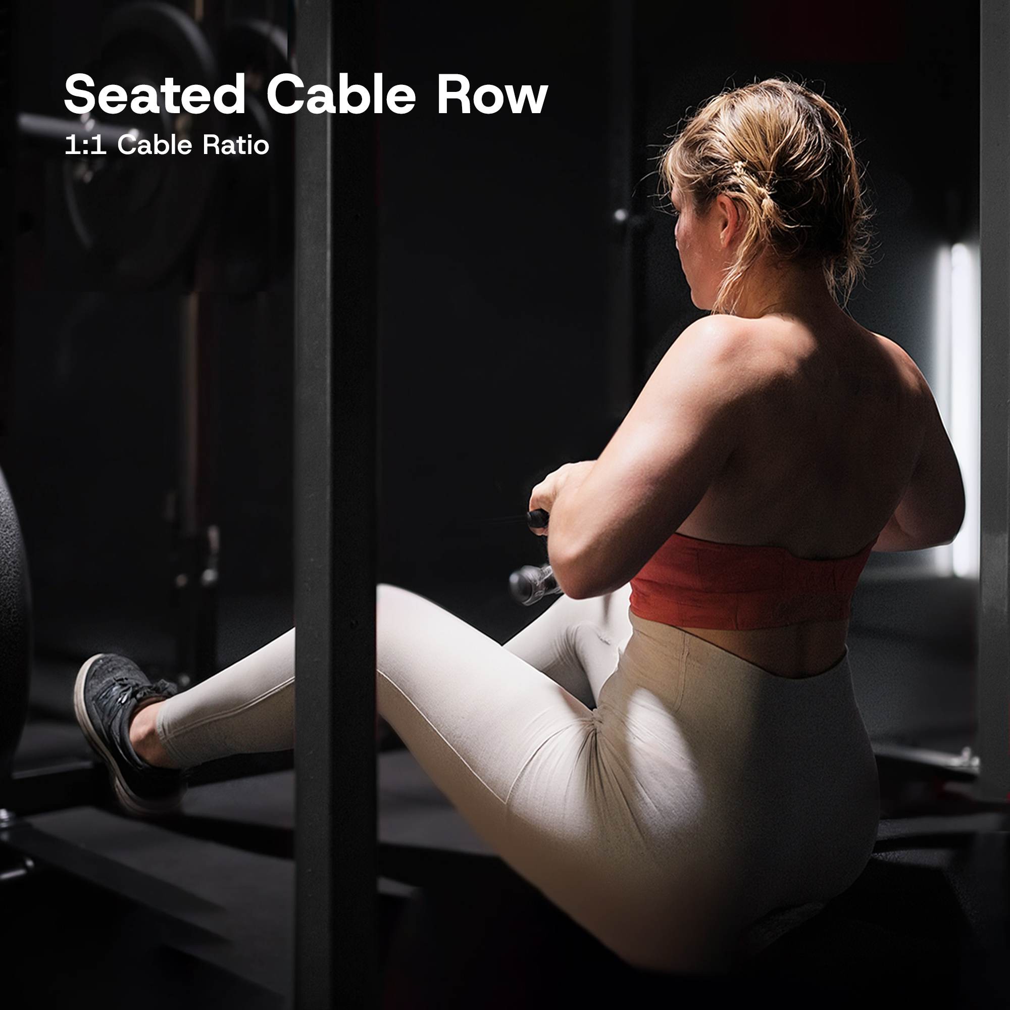 Woman performing a seated cable row exercise in a gym setting.