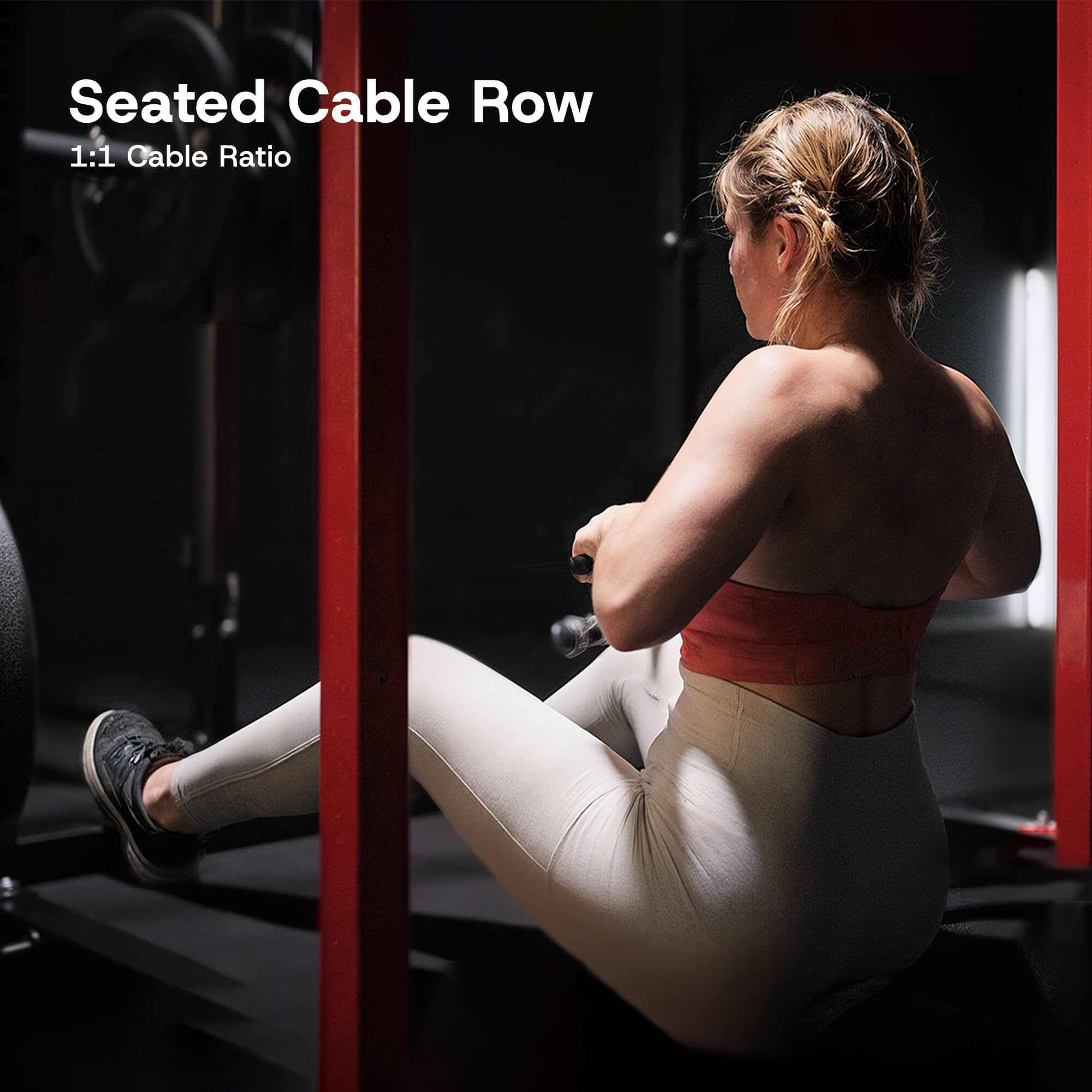 Person performing a seated cable row exercise in a gym setting.