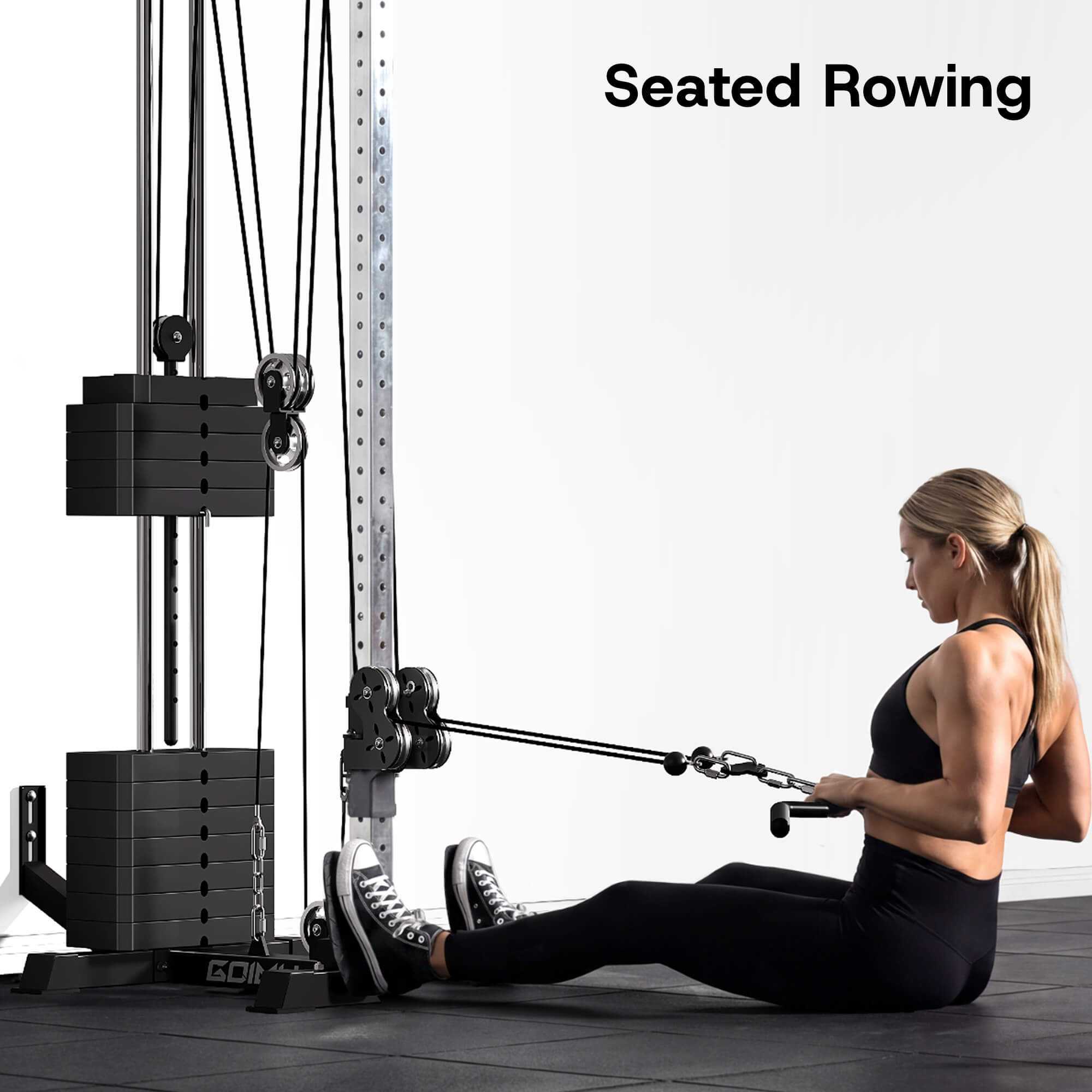 Woman using a seated rowing machine in a gym setting.