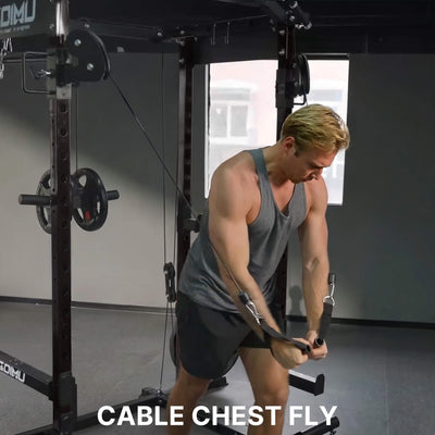 Man performing cable chest fly exercise in a gym setting.