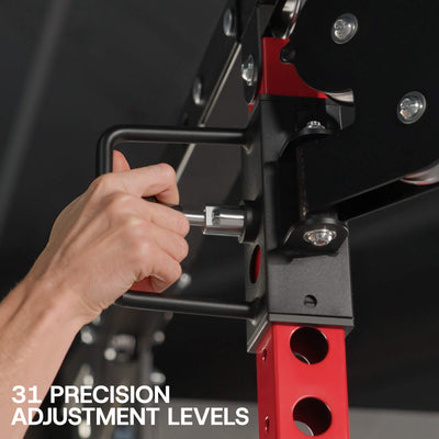 Hand making precise adjustments on a piece of gym equipment with text '31 Precision Adjustment Levels'.