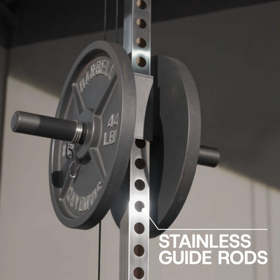 Barbell with weight plates on a rack with 'Stainless Guide Rods' text.