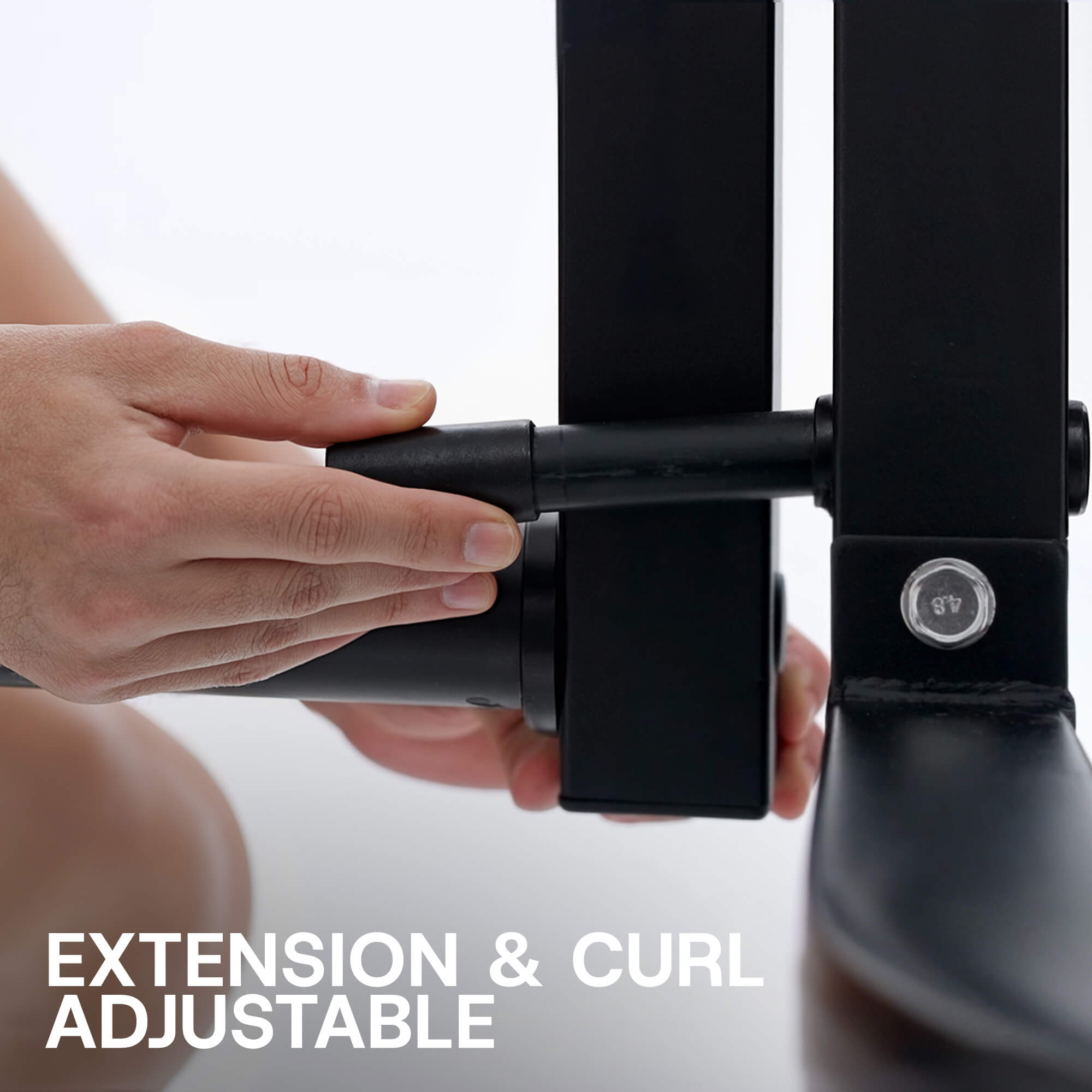 Person adjusting a black shoe extension and curl device on a white background.