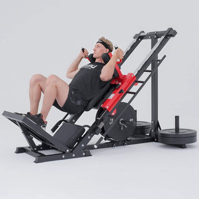 Person using a leg press machine on a white background.#color_red