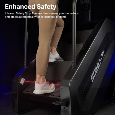 Person using a treadmill with enhanced safety features, including an infrared safety stop.