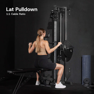 Woman using a lat pulldown machine with text 'Lat Pulldown 1:1 Cable Ratio' on a dark background.