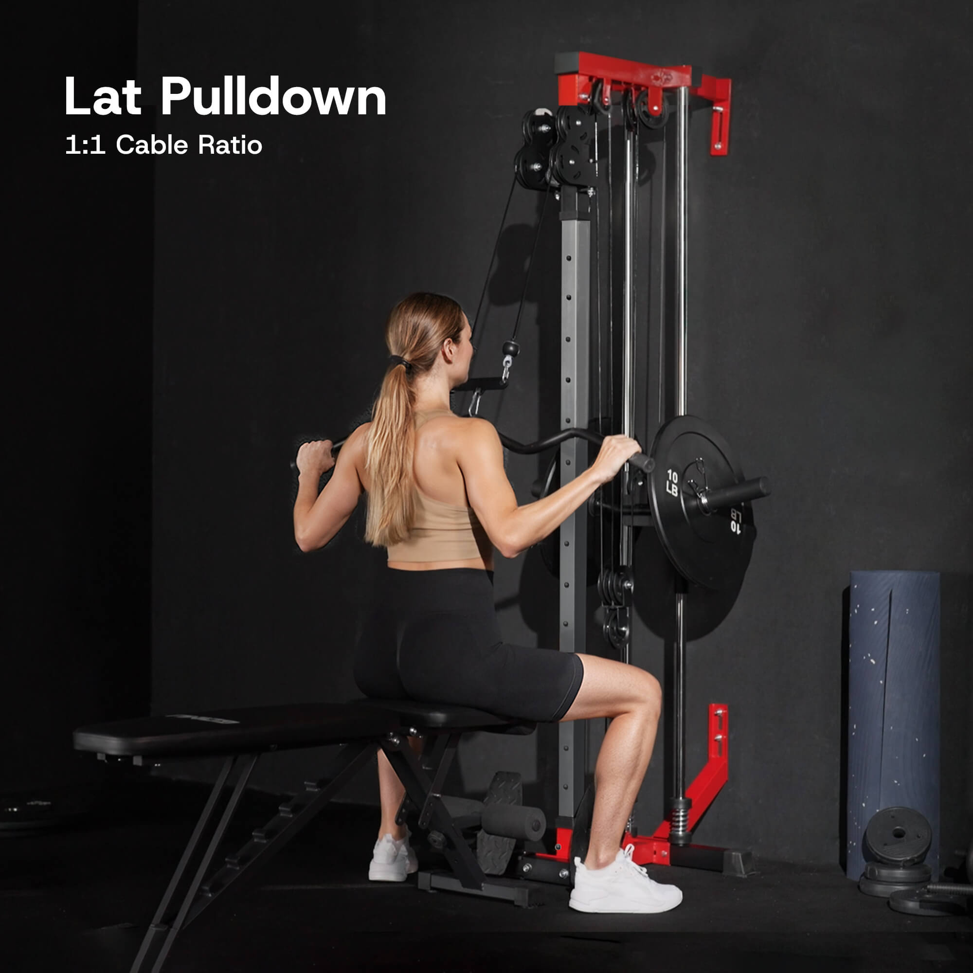 Woman using a lat pulldown machine in a gym setting with text 'Lat Pulldown 1:1 Cable Ratio'.