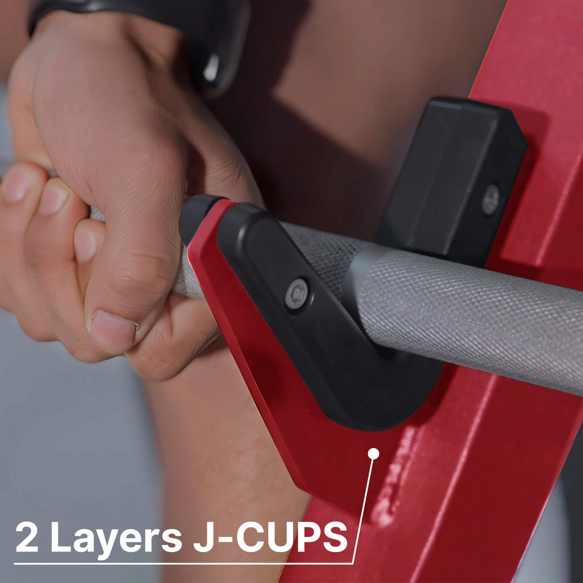Close-up of a person using a red exercise machine with '2 Layers J-CUPS' text.#color_red